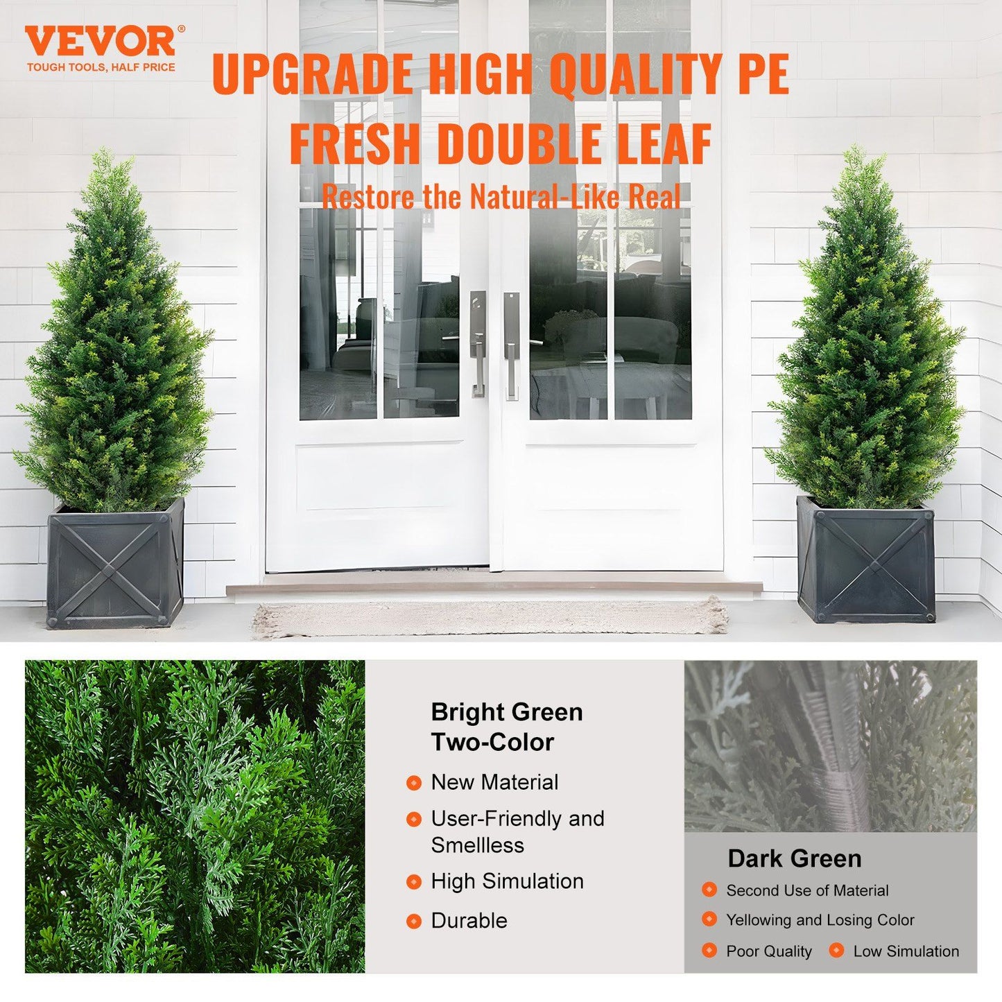 Pair of artificial cedar topiary trees in black planters flanking white double doors at entrance