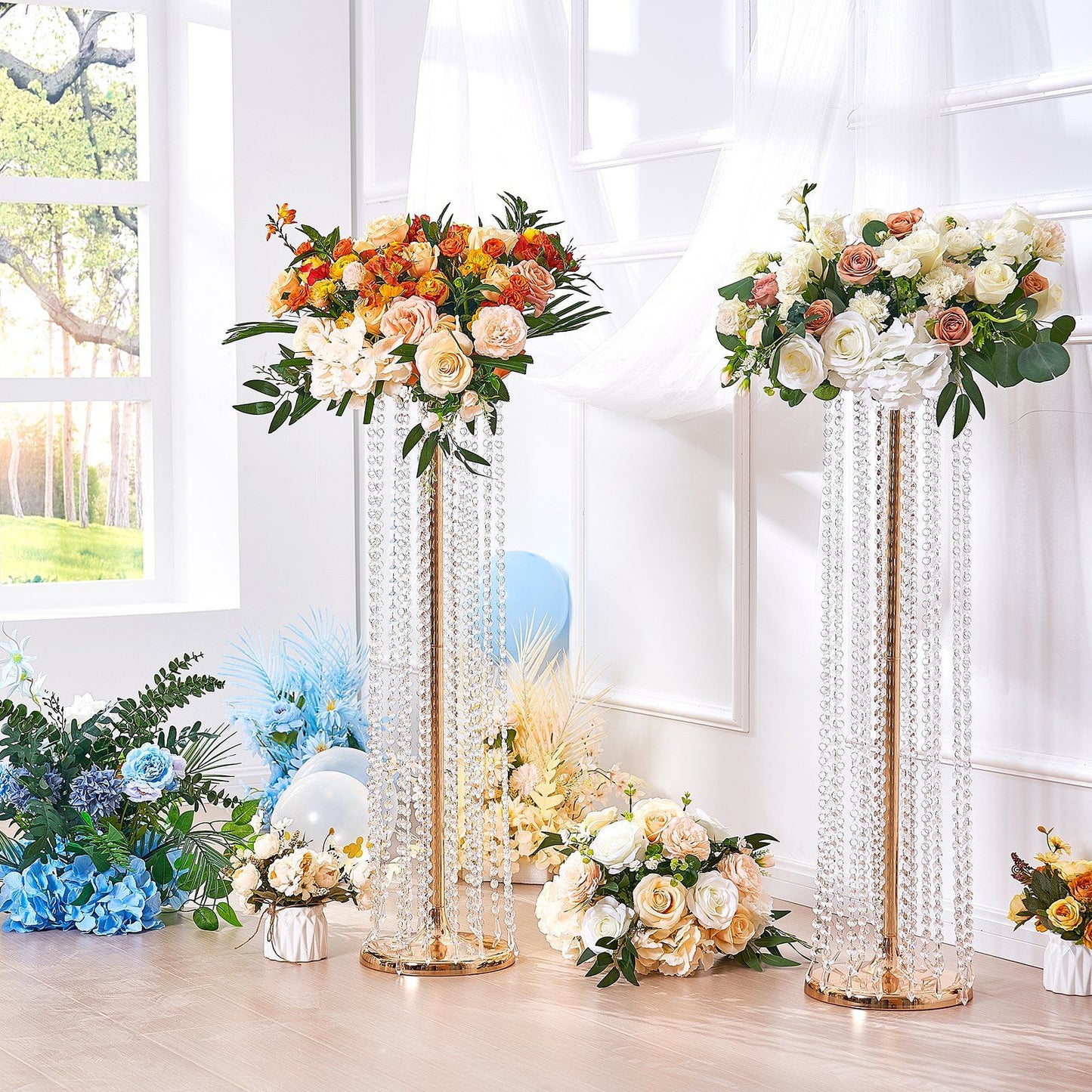 Crystal wedding flower stand with elegant floral arrangements in a bright room setting