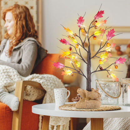 FauxMart.com autumn LED light-up decorative tree with fall leaves and acorns on white table