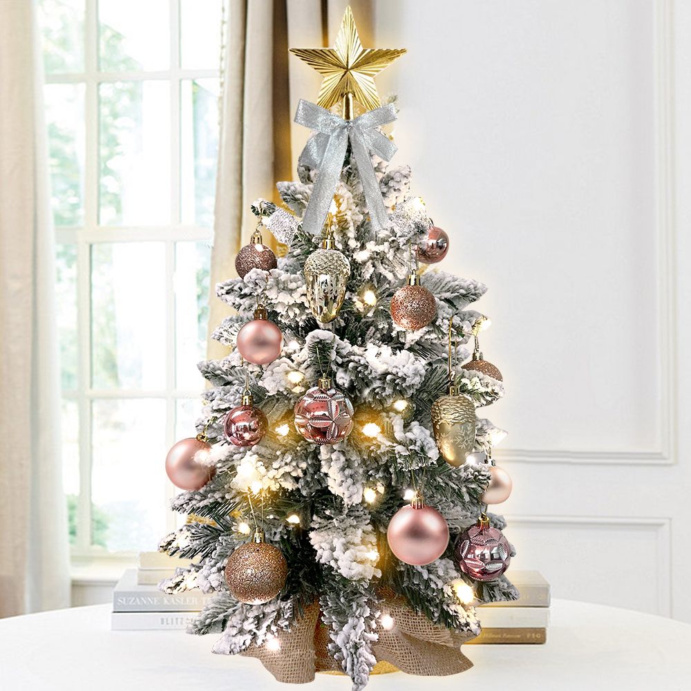 22 inch artificial Christmas tree silver with frosted branches and pink ornaments topped with gold star from FauxMart.com