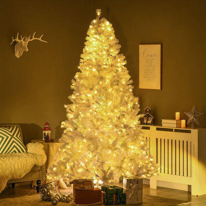7.5 ft prelit white Christmas tree glowing with warm white lights in cozy living room