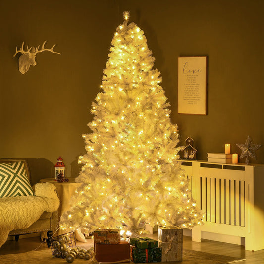 7.5 ft prelit white Christmas tree glowing with warm white lights in cozy living room