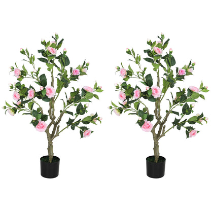 Pair of artificial camellia flowers in pots with pink blooms and green leaves in black containers