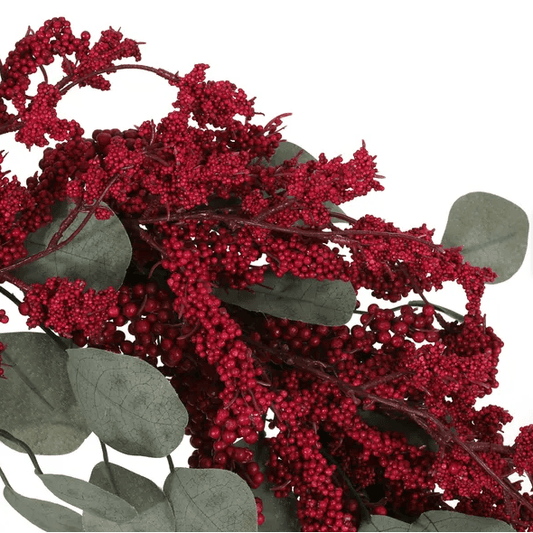 Artificial Christmas wreath with eucalyptus and red berries from FauxMart.com for festive decor