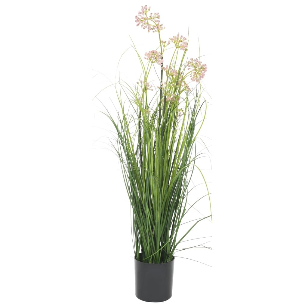 Tall artificial grass plant with flowers in a black pot for indoor decoration