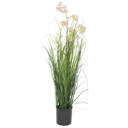 Tall artificial grass plant with flowers in a black pot for indoor decoration