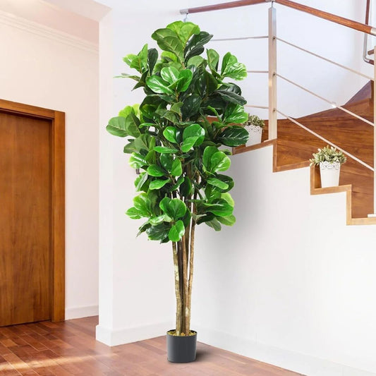 Tall artificial green plants indoor in a stylish pot, perfect for enhancing home decor