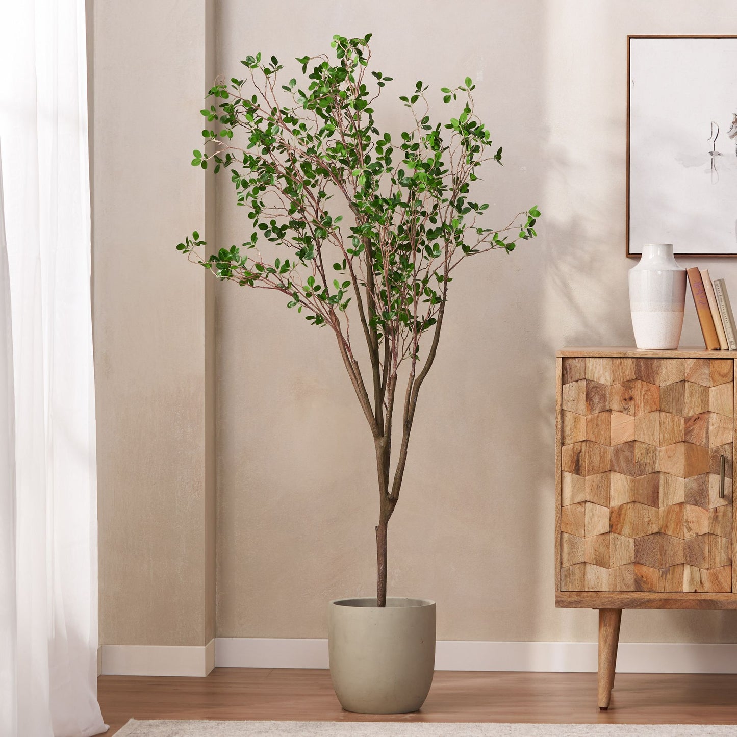 Artificial Milan Leaf Bonsai Tree in a modern planter, enhancing home decor with elegant greenery
