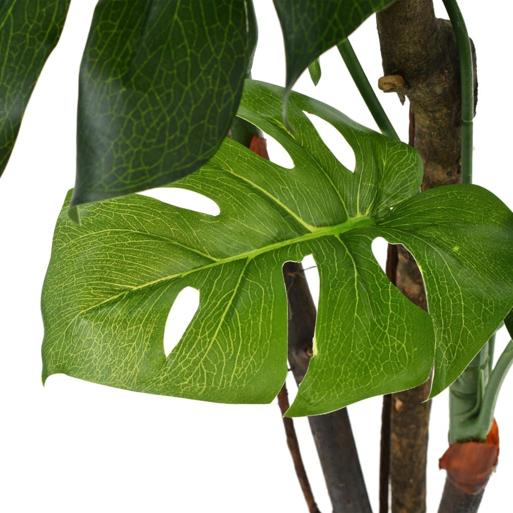 Realistic artificial monstera plant with vibrant green leaves and sturdy stems for home decor