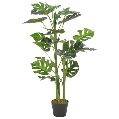 Lifelike artificial monstera plant in a black pot with vibrant green leaves