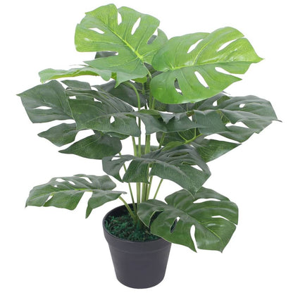 Lifelike artificial monstera plant in a black pot adding greenery to any space
