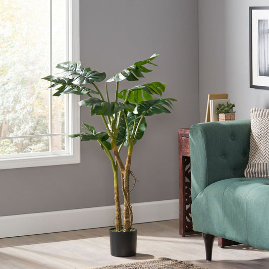 Artificial monstera tree 47 inch in a stylish pot, enhancing home decor with tropical vibes