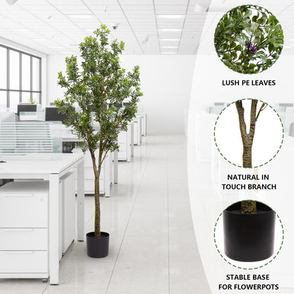Artificial outdoor garden branches in a modern office setting, featuring lush PE leaves and a stable base
