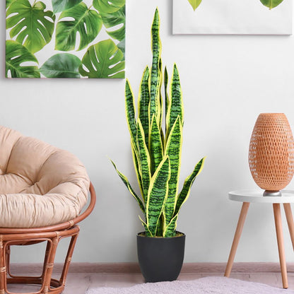 Realistic artificial snake plant decor in a black pot, perfect for home or office styling