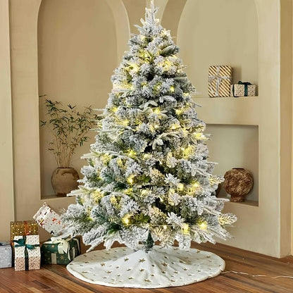 6 ft Christmas tree warm lights with a snowy effect and decorative holiday presents beneath it