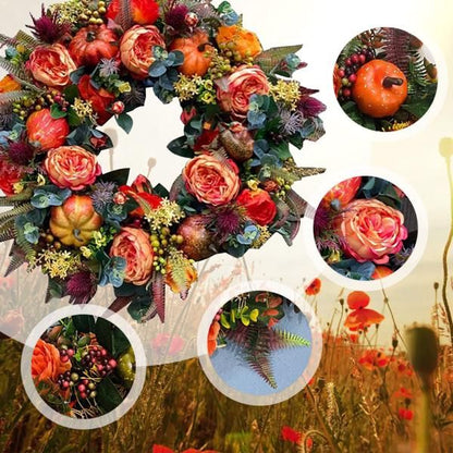 Autumn-themed artificial flower door wreath with orange roses, pumpkins, berries, and green foliage