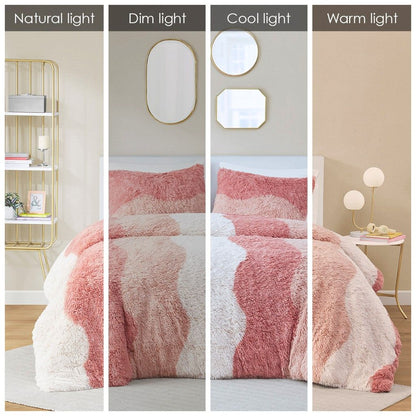 Ombre faux fur comforter set in shades of pink and cream displayed under natural, dim, cool, and warm lighting
