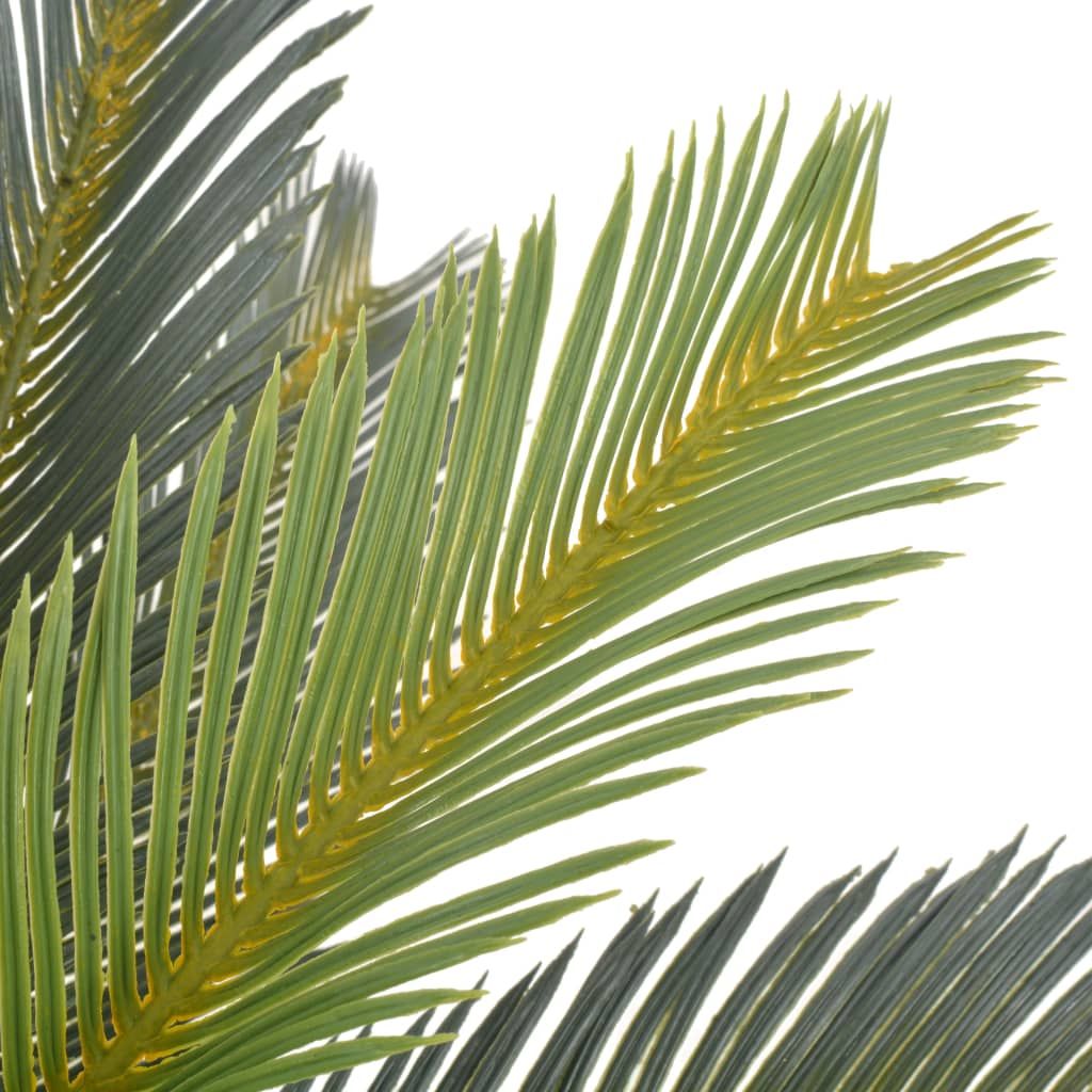 Realistic fake palm tree decor with vibrant green leaves for home or office decoration