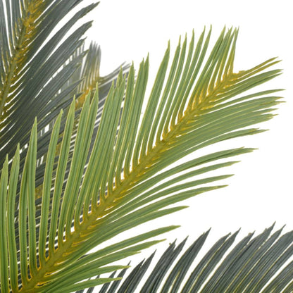 Realistic fake palm tree decor with vibrant green leaves for home or office decoration