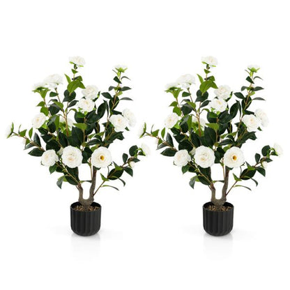 Set of two faux camellia trees in decorative pots with lush green leaves and white flowers