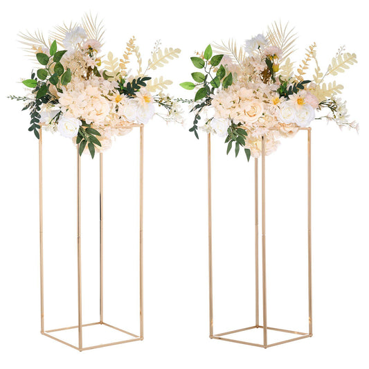 Elegant gold geometric flower stands with white floral arrangements and greenery for home decor
