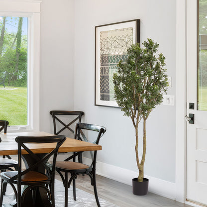Large artificial plants in a stylish pot, enhancing a modern dining area with natural appeal