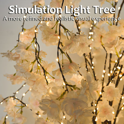 Lighted cherry blossom tree decor with soft white flowers and warm LED lights from FauxMart.com