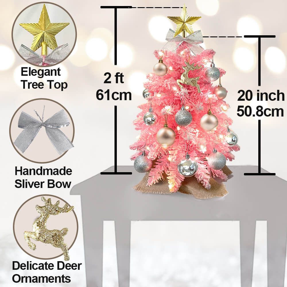 Small Xmas tree for office desk with pink branches, elegant gold star topper, silver bow, and deer ornaments