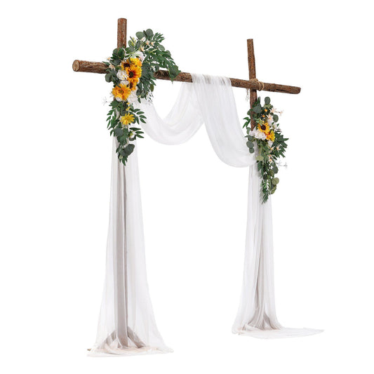 Sunflower wedding arch decor with wooden frame draped in white fabric and greenery accents