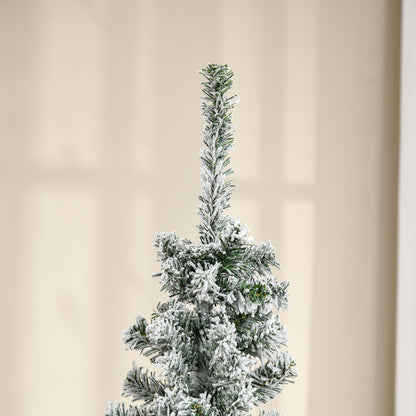 6 foot snow flocked Christmas tree with lush green branches covered in white snow for holiday decor