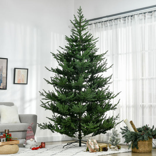 9 ft artificial Christmas tree with full green branches displayed in a living room setting