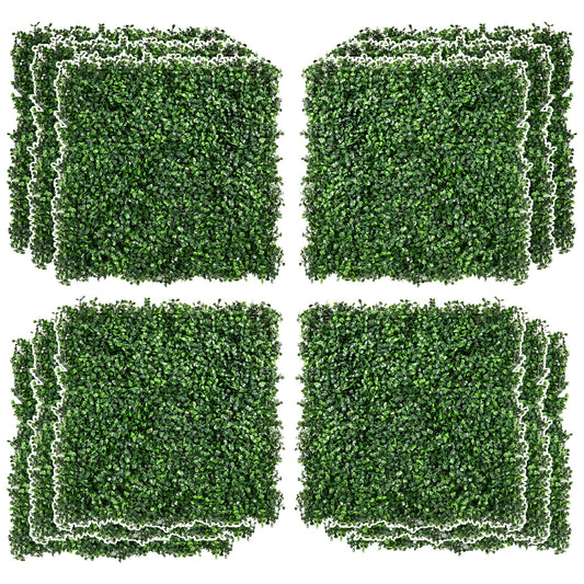 Set of green artificial boxwood hedge panels neatly stacked for decorative and privacy use