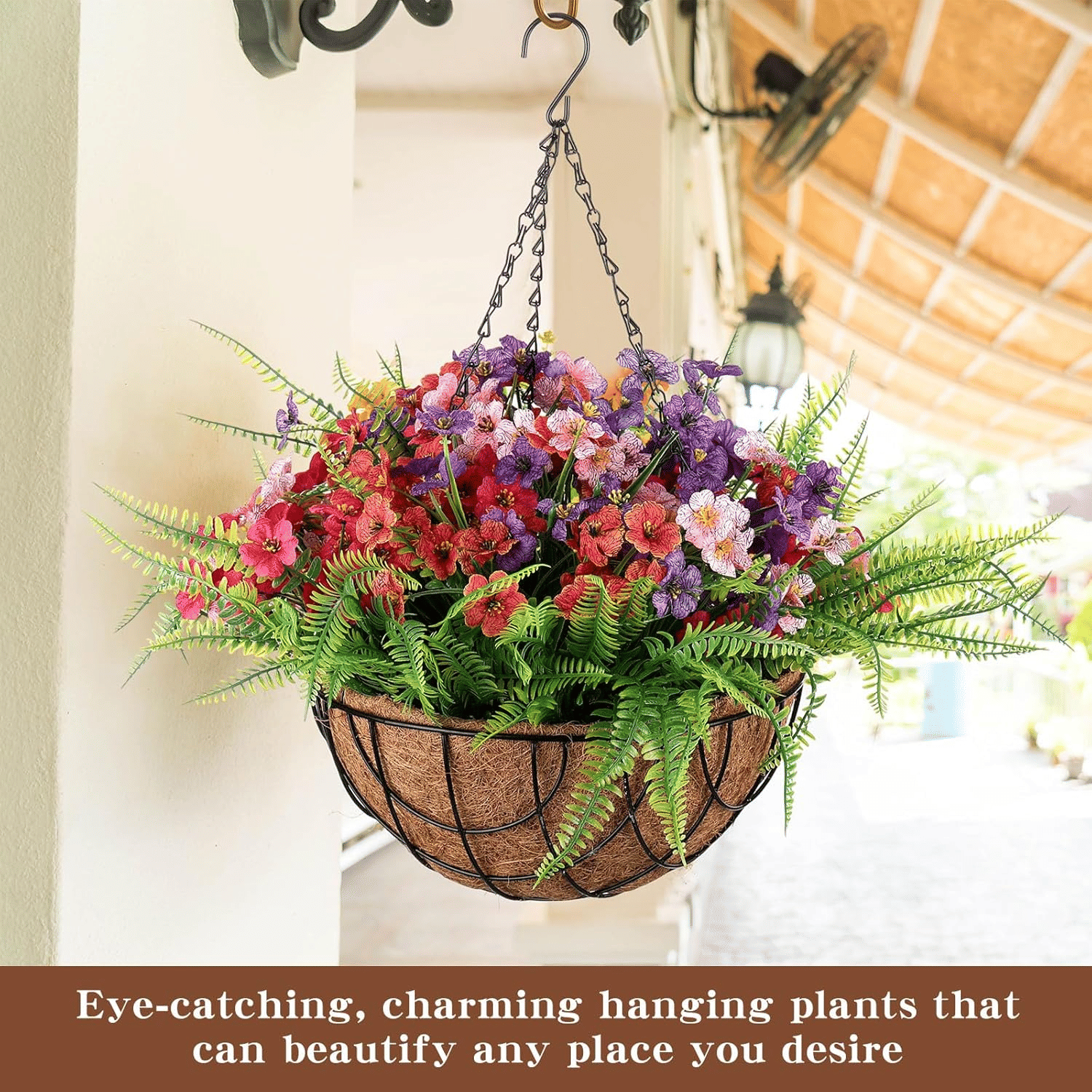 Colorful artificial hanging flower baskets outdoor with vibrant pink and purple flowers and green ferns