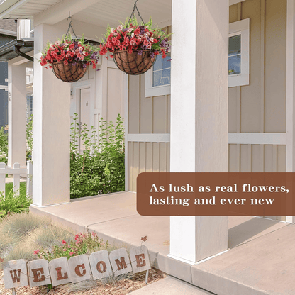 Artificial hanging flower baskets outdoor with vibrant red and purple blooms hanging on porch columns