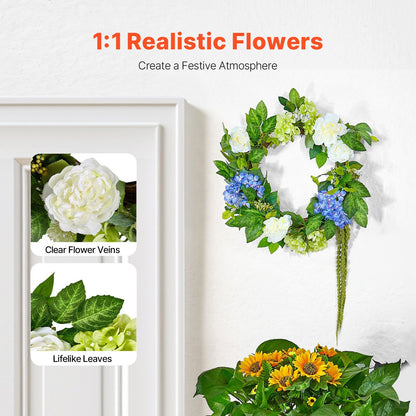 Artificial hydrangea wreath with white and blue flowers and lifelike green leaves hanging on a white wall