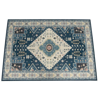 Blue and cream faux wool area rugs with intricate geometric and floral patterns