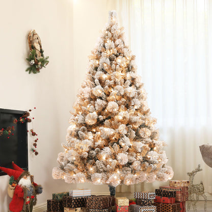 FauxMart.com pre-lit snow flocked Christmas tree decorated with warm white lights in cozy living room