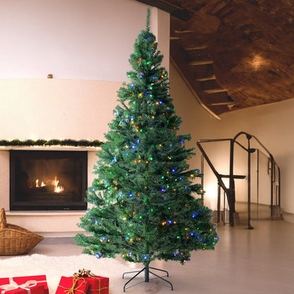 7.5 foot prelit Christmas tree with multicolor lights set up in modern living room near fireplace