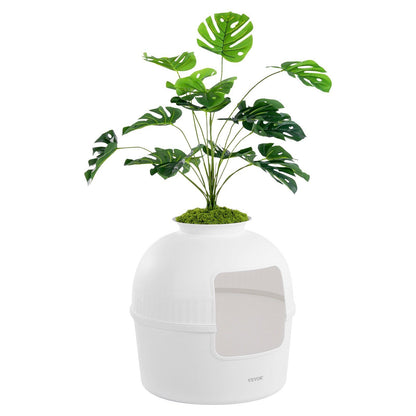 Stylish artificial plant litter box for cats with a modern design and lush green foliage on top