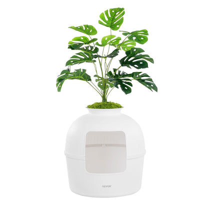Stylish artificial plant litter box for cats with a green leafy design, perfect for home decor