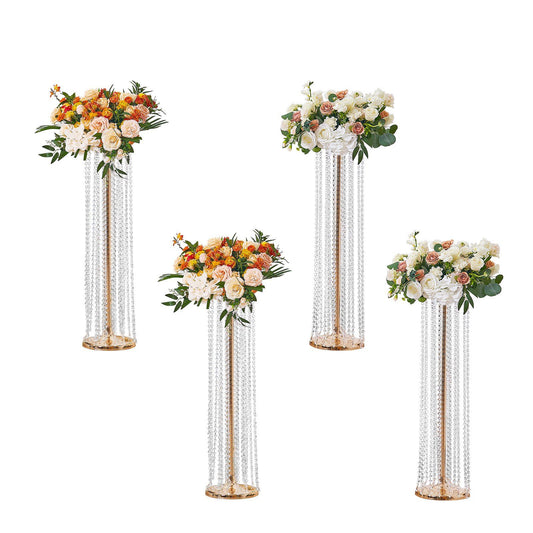 Elegant crystal wedding flower stand with cascading beads and floral arrangements in white and orange roses
