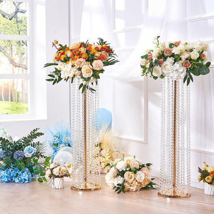 Crystal wedding flower stand with elegant floral arrangements in a bright room setting