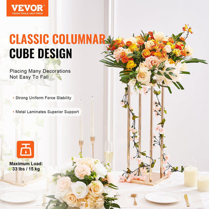 Gold metal wedding flower stands with classic columnar cube design holding floral arrangements
