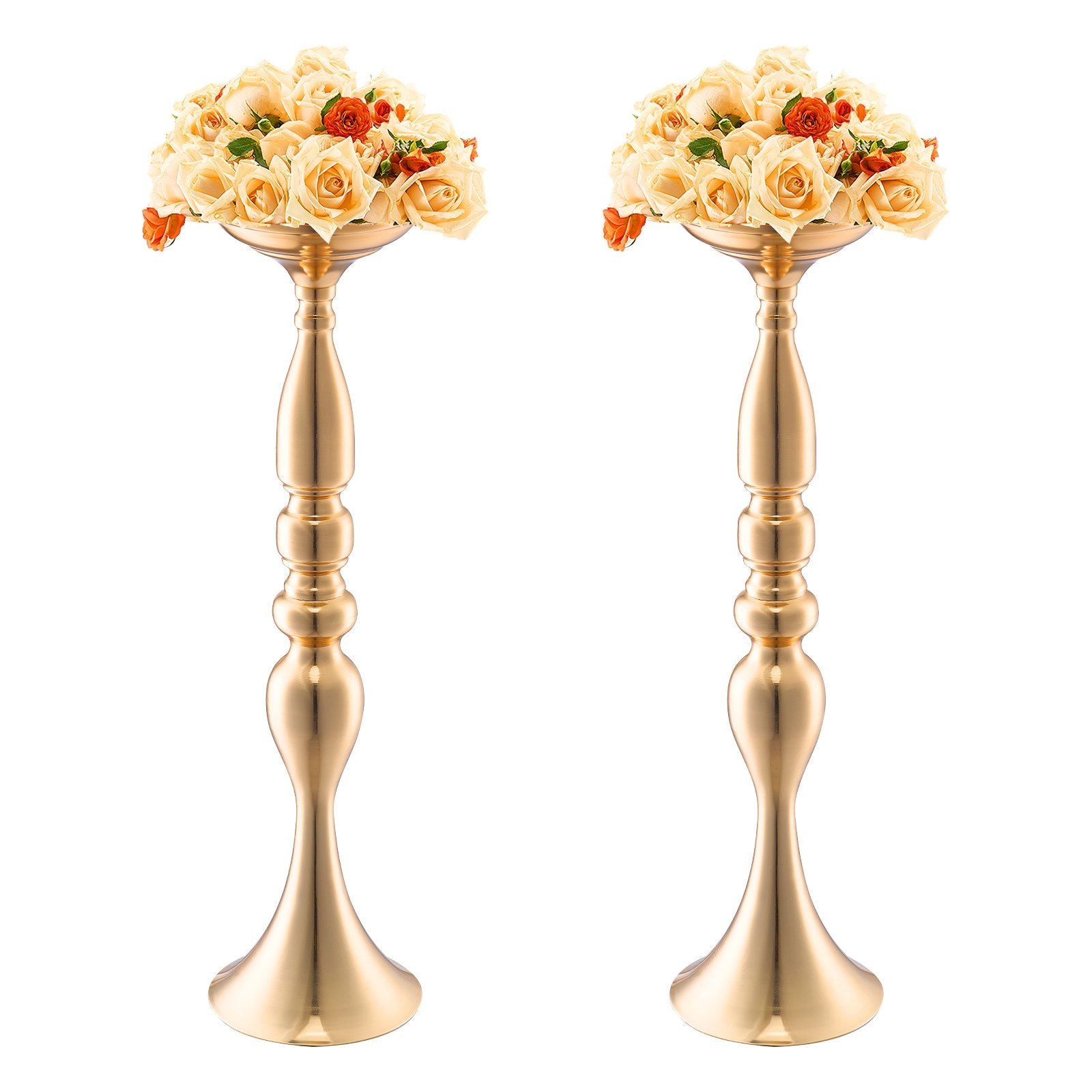 Pair of elegant gold wedding flower stands with cream and orange floral arrangements on top