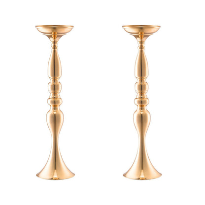 Pair of elegant gold wedding flower stands with smooth polished finish for event decoration