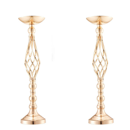 Pair of elegant gold wedding table flower stand with intricate lattice design and polished finish