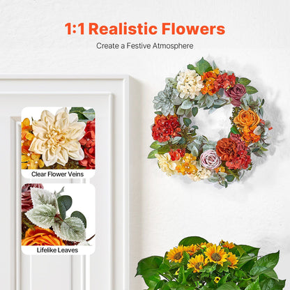 Colorful artificial hydrangea rose wreath with realistic flowers and lifelike leaves hanging on white wall